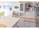 Kitchen features white cabinets and a large island at 3611 Yacht Club Rd # B, Edisto Island, SC 29438