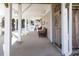 Covered patio with seating and outdoor shower at 3611 Yacht Club Rd # B, Edisto Island, SC 29438