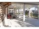 Covered patio with seating and outdoor shower at 3611 Yacht Club Rd # B, Edisto Island, SC 29438