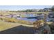 Scenic view of the calm water, private docks, and nearby houses at 3611 Yacht Club Rd # B, Edisto Island, SC 29438