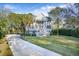 Two-story home with white siding, gray accents, and a spacious front porch at 366 Stringer Aly, Mount Pleasant, SC 29464