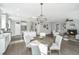 Bright and airy dining area features a round table and chairs near the kitchen at 4023 Cascades Thrust, Summerville, SC 29483