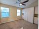 Bright bedroom featuring built-in shelving and ceiling fan at 403 Reserve Way, Summerville, SC 29485