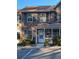 Attractive brick townhome with front porch and landscaping at 403 Reserve Way, Summerville, SC 29485