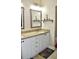 Double vanity bathroom with granite countertops and updated fixtures at 404 Claymoor Village Ln, Summerville, SC 29486