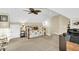 Bright bonus room with daybed, workspace and ceiling fan at 404 Claymoor Village Ln, Summerville, SC 29486