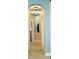 Bright hallway with arched entryways and decorative wall art at 404 Claymoor Village Ln, Summerville, SC 29486
