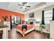 Spacious main bedroom with an accent wall and hardwood floors at 404 Claymoor Village Ln, Summerville, SC 29486