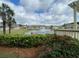 Scenic pond view with fountain and lush landscaping at 404 Claymoor Village Ln, Summerville, SC 29486