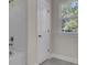 Bathroom with a shower and linen closet at 5629 Ellington School Rd, Ravenel, SC 29470
