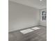 Spacious bedroom with large window and neutral wall colors at 5629 Ellington School Rd, Ravenel, SC 29470