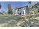 Two-story white house with large backyard at 5629 Ellington School Rd, Ravenel, SC 29470