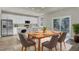 Modern kitchen with white cabinets, stainless steel appliances, and an island at 5629 Ellington School Rd, Ravenel, SC 29470