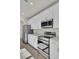 Modern kitchen with stainless steel appliances and white cabinets at 5629 Ellington School Rd, Ravenel, SC 29470