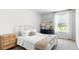 Charming bedroom featuring a white bed frame and ample natural light at 6261 Gritman Dr, Hollywood, SC 29470