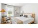 Cozy bedroom with a queen bed and a comfortable armchair at 6261 Gritman Dr, Hollywood, SC 29470