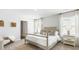Spacious bedroom with a king-size bed and ensuite bathroom access at 6261 Gritman Dr, Hollywood, SC 29470