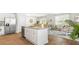 Open kitchen with island, stainless steel appliances, and granite countertops at 6261 Gritman Dr, Hollywood, SC 29470