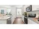Modern kitchen with stainless steel appliances and granite countertops at 6261 Gritman Dr, Hollywood, SC 29470