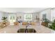 Open concept kitchen and living area with granite countertops at 6261 Gritman Dr, Hollywood, SC 29470