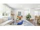 Open living room with hardwood floors and access to the kitchen at 6261 Gritman Dr, Hollywood, SC 29470