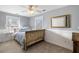 Cozy bedroom featuring a vintage sleigh bed and neutral color palette at 780 Post Oak Dr, Mount Pleasant, SC 29464