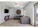 Spacious common area with sectional sofa and access to deck at 780 Post Oak Dr, Mount Pleasant, SC 29464