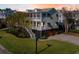 Two-story house with attached garage at sunset at 780 Post Oak Dr, Mount Pleasant, SC 29464