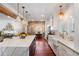 Bright kitchen with marble island, white cabinets, and stainless steel appliances at 780 Post Oak Dr, Mount Pleasant, SC 29464