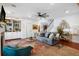 Spacious living room with hardwood floors, fireplace, and built-in shelving at 780 Post Oak Dr, Mount Pleasant, SC 29464