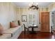 Bright reading nook with window seat, chandelier, and hardwood floors at 780 Post Oak Dr, Mount Pleasant, SC 29464