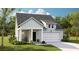 Charming one-story home with a front porch and two-car garage at 1018 Currant Rd, Summerville, SC 29485
