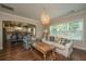 Bright living room with comfortable sofas and hardwood floors at 109 Rawlins Dr, Summerville,  29485