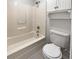 Clean bathroom with shower/tub combo and built-in shelving at 113 Evergreen Magnolia Ave, Goose Creek,  29445