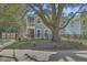 Two-story house with gray siding and a large oak tree in the front yard at 119 Germantown Rd, Summerville,  29483