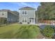 Gray house with a large backyard and a playset at 119 Germantown Rd, Summerville,  29483