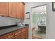 Bright dining room with light green walls and hardwood floors at 130 Sarmiento Ln, Summerville,  29483