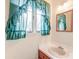 Small bathroom with single sink vanity and ruffled curtains at 185 Old Fort Dr, Ladson, SC 29456