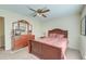 Spacious bedroom with wood furniture and carpeting at 185 Old Fort Dr, Ladson, SC 29456