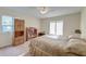 Bedroom with double bed, window, and built-in shelving at 185 Old Fort Dr, Ladson, SC 29456