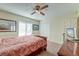 Bright bedroom with sliding glass doors and a ceiling fan at 185 Old Fort Dr, Ladson, SC 29456