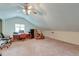 Large bonus room with sloped ceilings and ample workspace at 185 Old Fort Dr, Ladson, SC 29456