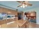 Bright dining area with wood table and chairs, adjacent to the kitchen at 185 Old Fort Dr, Ladson, SC 29456