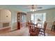 Bright dining area with wood table and chairs, and built-in hutch at 185 Old Fort Dr, Ladson, SC 29456