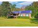 Brick house with solar panels and landscaping at 185 Old Fort Dr, Ladson, SC 29456