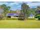 Brick ranch home with solar panels and landscaped yard at 185 Old Fort Dr, Ladson, SC 29456