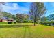 House with a large front yard and solar panels at 185 Old Fort Dr, Ladson, SC 29456