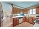Kitchen with wood cabinets, tile flooring, and stainless steel appliances at 185 Old Fort Dr, Ladson, SC 29456