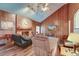 Spacious living room with vaulted ceiling, wood paneling, and fireplace at 185 Old Fort Dr, Ladson, SC 29456