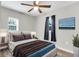 Main bedroom with ceiling fan, and a calming color scheme at 1979 Macon Ave, North Charleston, SC 29405